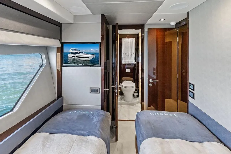 Slide: The Image of Luxurious interior of 2019 Sunseeker 76 Yacht with twin beds and en-suite bathroom. - 38