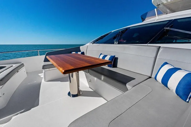 Slide: The Image of Luxurious 2019 Sunseeker 76 Yacht deck with seating and ocean view. - 42