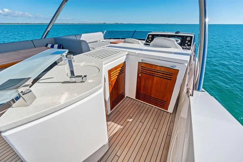 Slide: The Image of Luxurious 2019 Sunseeker 76 Yacht deck with modern amenities and ocean view. - 49