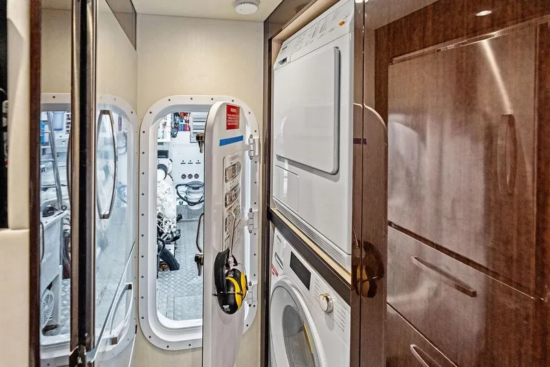 Slide: The Image of Laundry area and engine room access on 2019 Sunseeker 76 Yacht. - 67