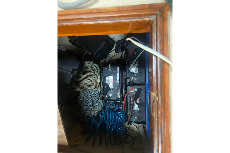 Slide: The Image of Battery compartment of 1962 Ted Hood Little Harbor 40 Yawl with ropes and cables. - 24