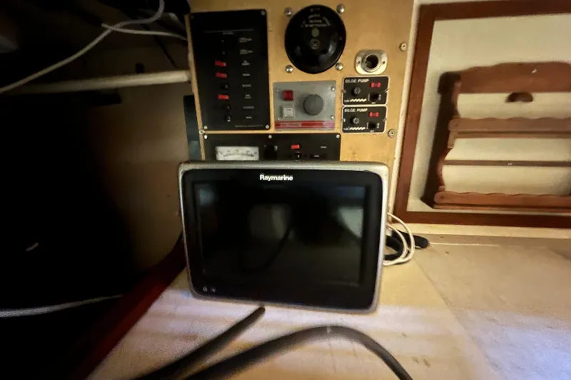 Slide: The Image of Control panel and Raymarine display on 1962 Ted Hood Little Harbor 40 Yawl. - 26