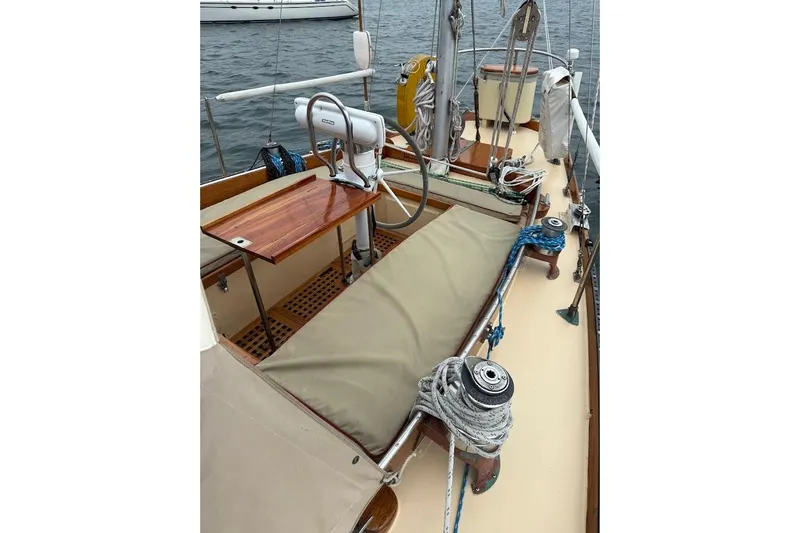 Slide: The Image of 1962 Ted Hood Little Harbor 40 Yawl deck with steering wheel and ropes. - 30