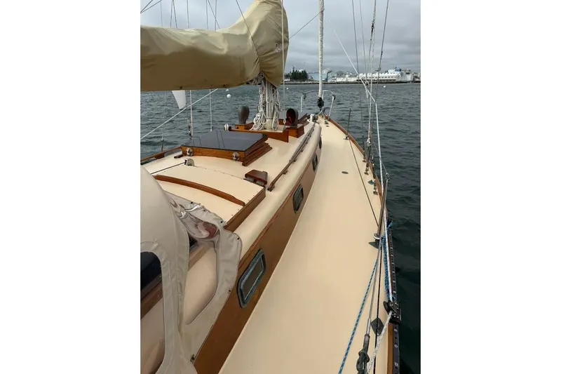 Slide: The Image of 1962 Ted Hood Little Harbor 40 Yawl sailboat on water, showcasing deck and rigging. - 36