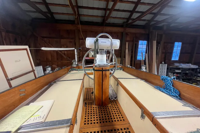 Slide: The Image of Interior view of a 1962 Ted Hood Little Harbor 40 Yawl, showcasing the helm and cabin details. - 43