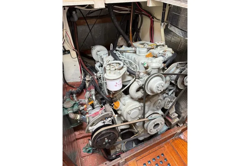 Slide: The Image of Engine of a 1962 Ted Hood Little Harbor 40 Yawl, showcasing mechanical components. - 47