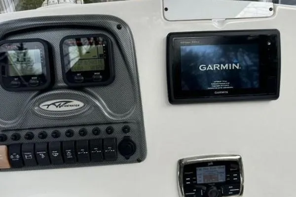 Slide: The Image of Dashboard of a 2015 Tidewater 232 LXF boat with Garmin navigation system. - 12