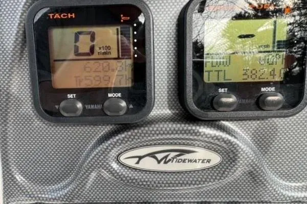Slide: The Image of Tidewater 232 LXF 2015 dashboard with Yamaha tachometer and speedometer displays. - 14