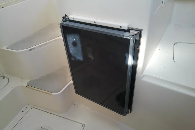 Slide: The Image of 1995 Grady-White Sailfish 272 boat interior with Norcold refrigerator. - 27