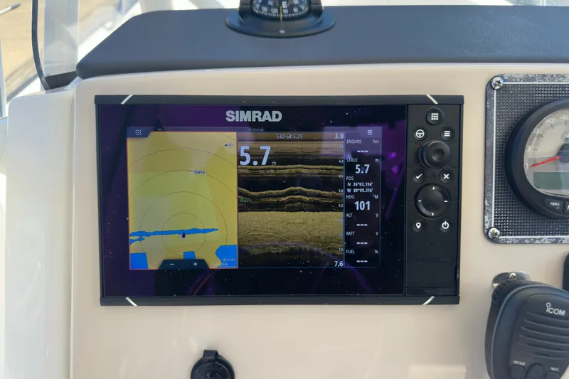 Slide: The Image of Simrad navigation display on 2022 Boston Whaler 210 Montauk boat dashboard. - 11