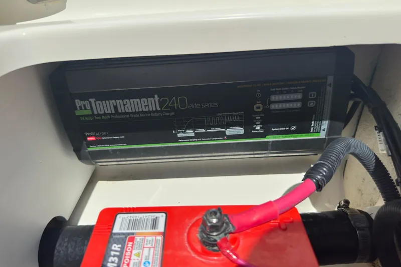 Slide: The Image of ProTournament 240 Elite marine battery charger in 2022 Boston Whaler 210 Montauk boat. - 19