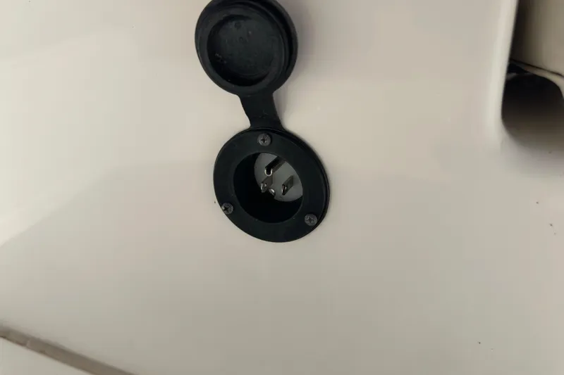 Slide: The Image of 2022 Boston Whaler 210 Montauk boat power outlet detail. - 20