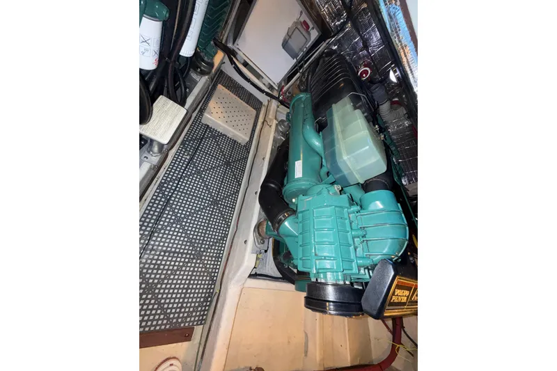 Slide: The Image of Engine compartment of a 1997 Norstar 301, featuring a Volvo Penta engine. - 31