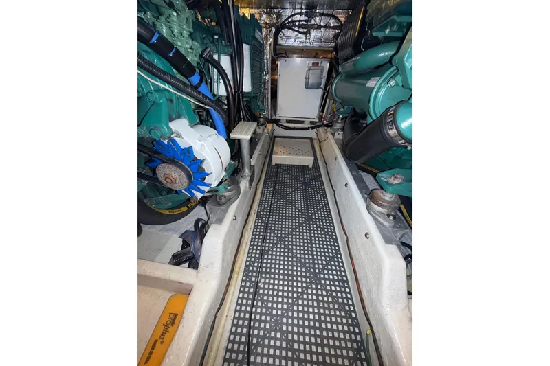 Slide: The Image of Engine room of a 1997 Norstar 301 boat, showcasing mechanical components. - 32