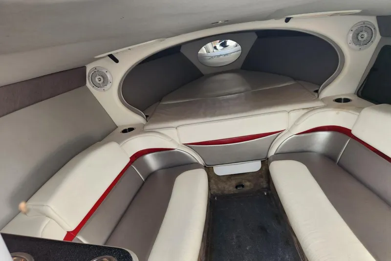 Slide: The Image of 2008 Formula 292 FASTech cabin interior with white and red seating, speakers, and cozy layout. - 10