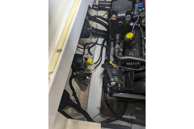 Slide: The Image of Engine compartment of a 2008 Formula 292 FASTech boat, showing detailed components and wiring. - 12