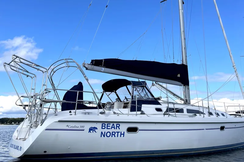 The Image of 2001 Catalina 380 sailboat "Bear North" docked under clear blue sky. - 0