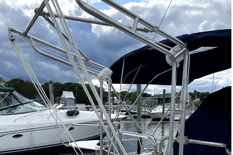 Slide: The Image of Sailboat marina view with Catalina 380, 2001 model, under cloudy skies. - 5