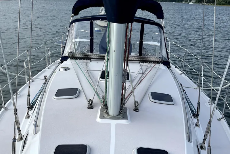Slide: The Image of Sailboat deck view of 2001 Catalina 380 on calm water. - 6