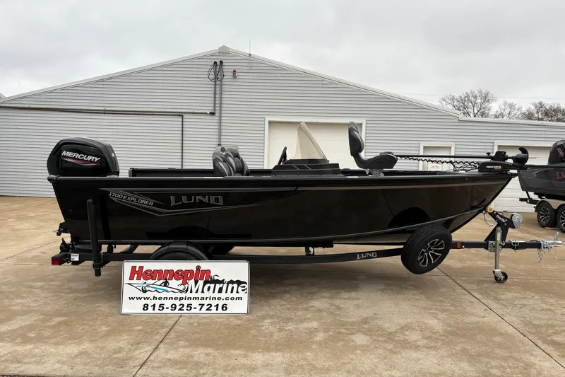 The Image of 2026 Lund 1700 Explorer SS boat on trailer at Hennepin Marine dealership. - 0