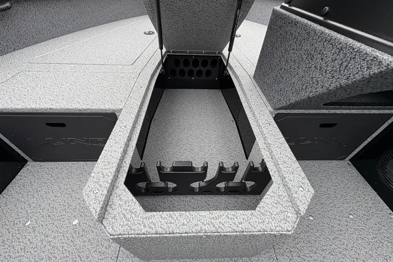 Slide: The Image of 2026 Lund 1700 Explorer SS boat interior storage compartment, open lid, gray textured finish. - 16
