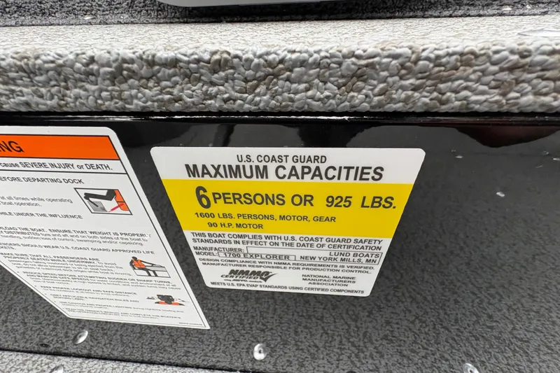 Slide: The Image of 2026 Lund 1700 Explorer SS capacity label: 6 persons or 925 lbs, 90 HP motor. - 20