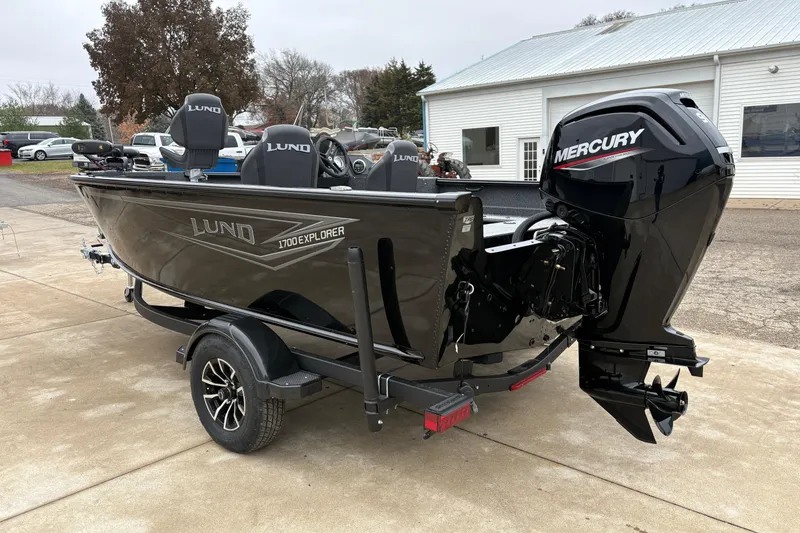 Slide: The Image of 2026 Lund 1700 Explorer SS boat with Mercury engine on a trailer. - 3