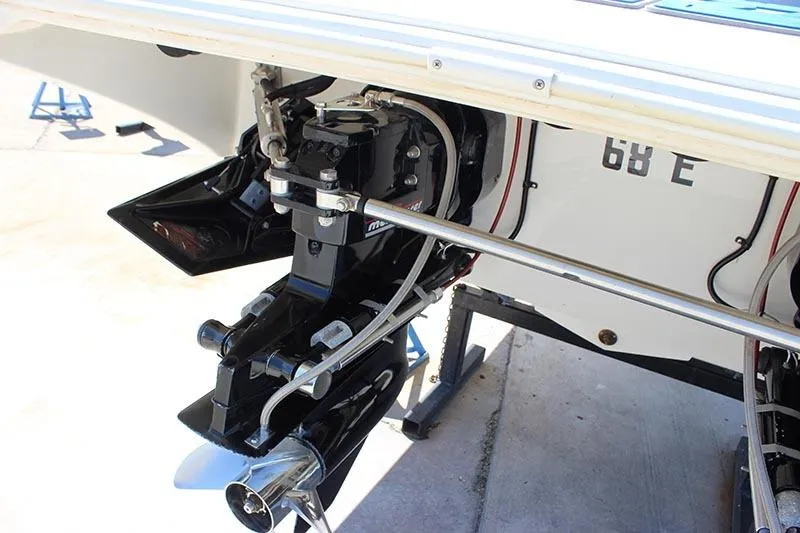 Slide: The Image of Rear view of a 2000 Fountain 32 Fever boat's engine and propeller system. - 24