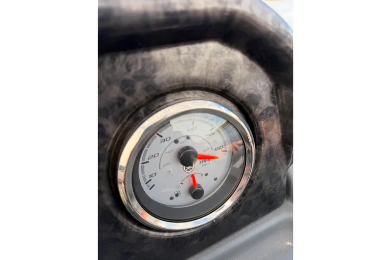 Slide: The Image of Close-up of SunCatcher ELITE SERIES 324 SS 2025 speedometer, showing detailed gauge design. - 16