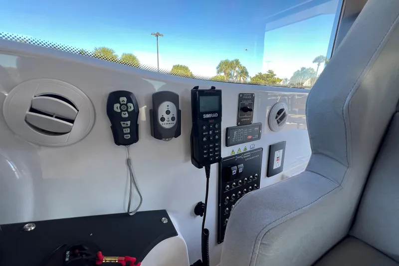 Slide: The Image of Control panel of 2024 XO Boats EXPLR 10 S Plus with navigation equipment. - 49