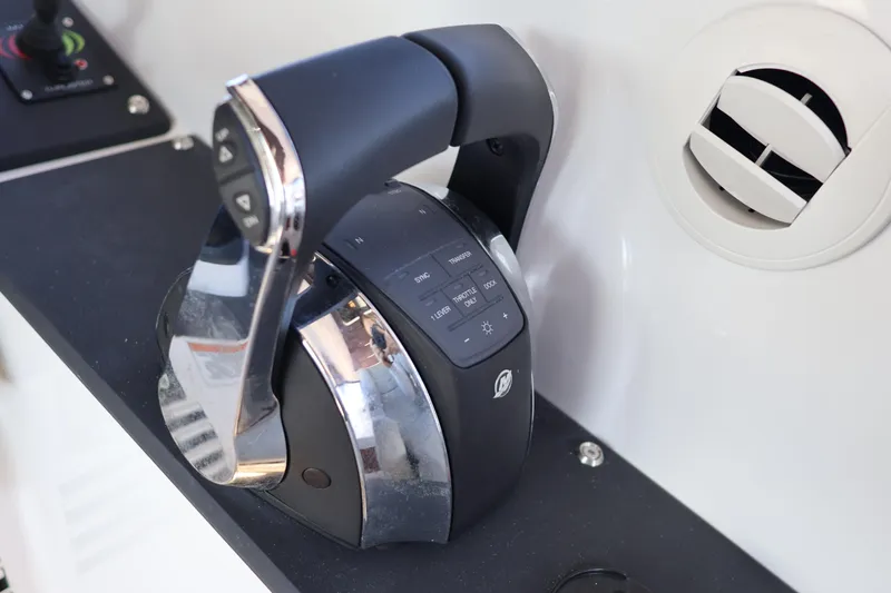 Slide: The Image of Throttle control of 2024 XO Boats EXPLR 10 S Plus, featuring modern design and functionality. - 53