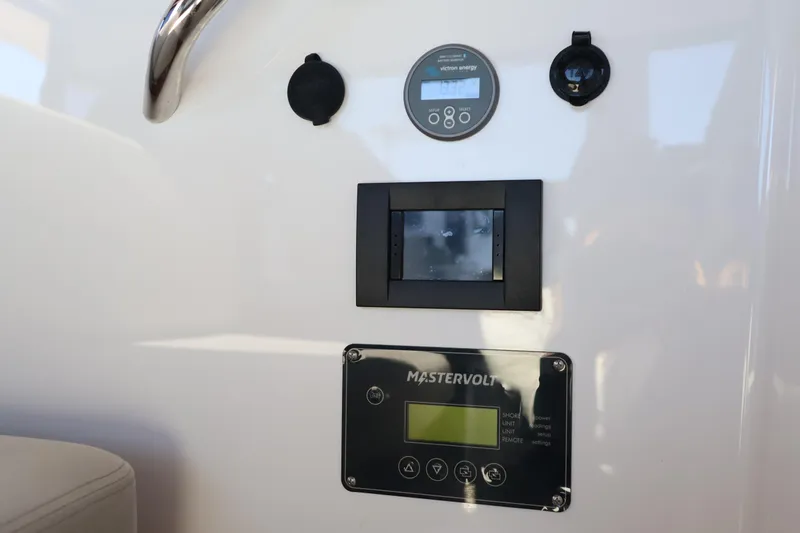 Slide: The Image of Control panel of 2024 XO Boats EXPLR 10 S Plus with Mastervolt display. - 59