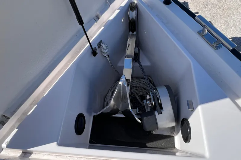 Slide: The Image of Anchor compartment of 2024 XO Boats EXPLR 10 S Plus, featuring modern design and equipment. - 67