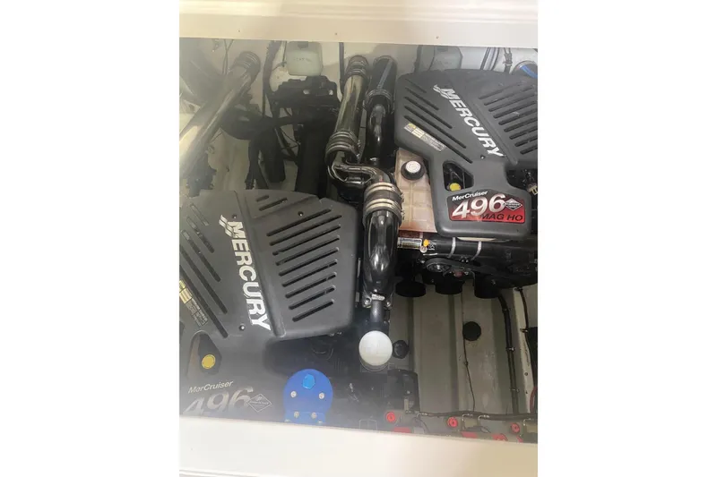 Slide: The Image of 2004 Fountain 38 Lightning engine bay with dual Mercury MerCruiser 496 MAG HO engines. - 12