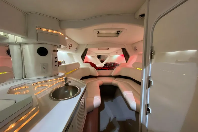 Slide: The Image of Luxurious interior of a 2004 Fountain 38 Lightning boat with modern amenities. - 13