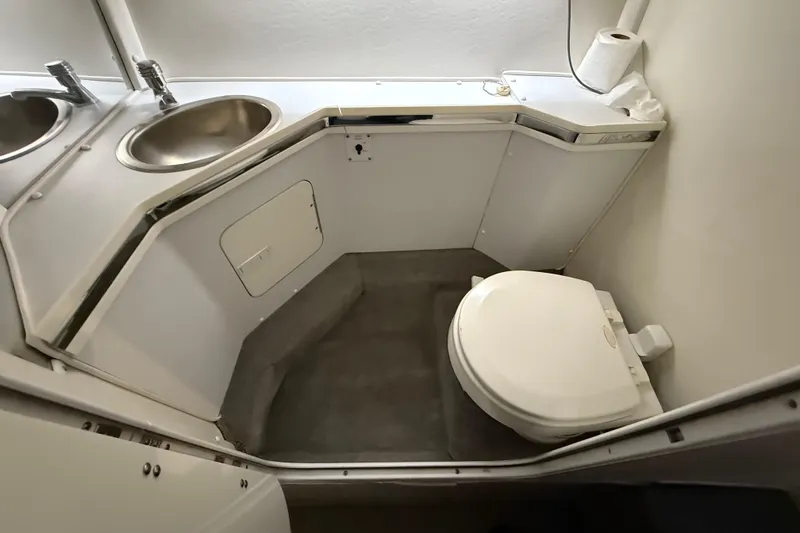 Slide: The Image of 2004 Fountain 38 Lightning boat bathroom with sink and toilet. - 17