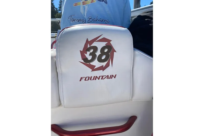 Slide: The Image of 2004 Fountain 38 Lightning boat seat with logo and design details. - 8