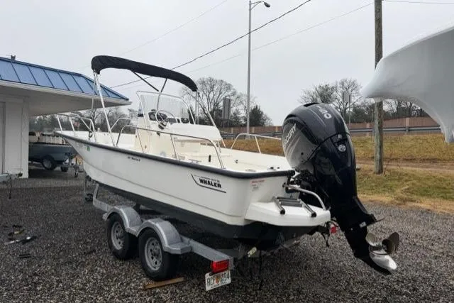 Slide: The Image of 2017 Boston Whaler 190 Montauk boat on trailer with outboard motor. - 3
