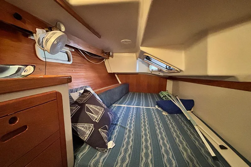 Slide: The Image of Cozy cabin interior of 1999 Catalina 42 MkII sailboat with nautical decor. - 20
