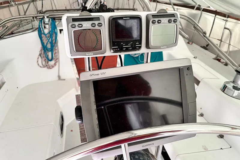 Slide: The Image of Cockpit of 1999 Catalina 42 MkII sailboat with navigation instruments and GPS display. - 23