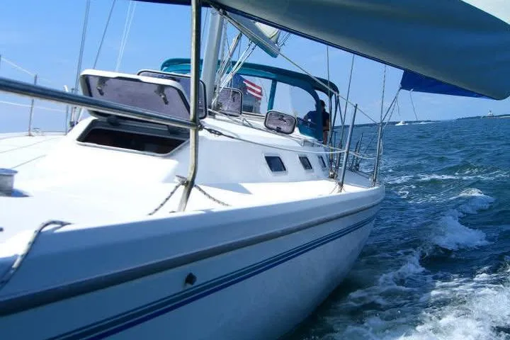 Slide: The Image of Sailing Catalina 42 MkII yacht, 1999 model, cruising on open water. - 3
