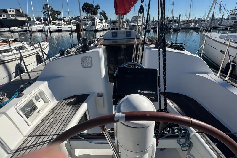 Slide: The Image of Cockpit view of 2004 Jeanneau Sun Fast 35 sailboat docked in marina. - 11