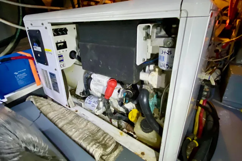 Slide: The Image of Close-up of a 1971 Hatteras 43 Double Cabin boat's shaft seal system. - 102