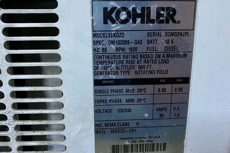 Slide: The Image of 1971 Hatteras 43 Double Cabin yacht docked at sunset, marina background. - 109