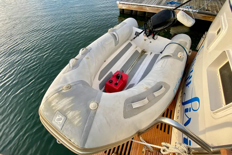 Slide: The Image of 1971 Hatteras 43 Double Cabin interior with wooden handrails and seating area. - 18