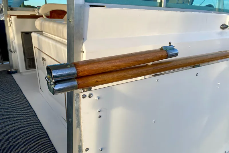 Slide: The Image of 1971 Hatteras 43 Double Cabin yacht docked at marina during sunset. - 20