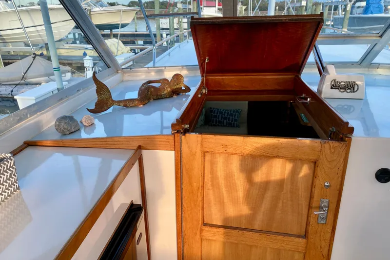 Slide: The Image of Garmin navigation display and compass on 1971 Hatteras 43 Double Cabin yacht. - 37