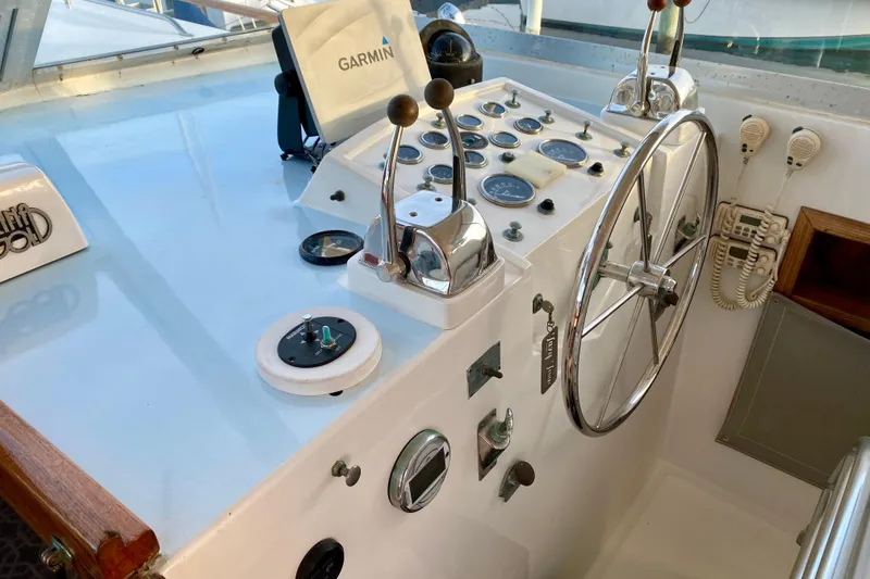 Slide: The Image of Control panel of a 1971 Hatteras 43 Double Cabin boat with gauges and dials. - 38