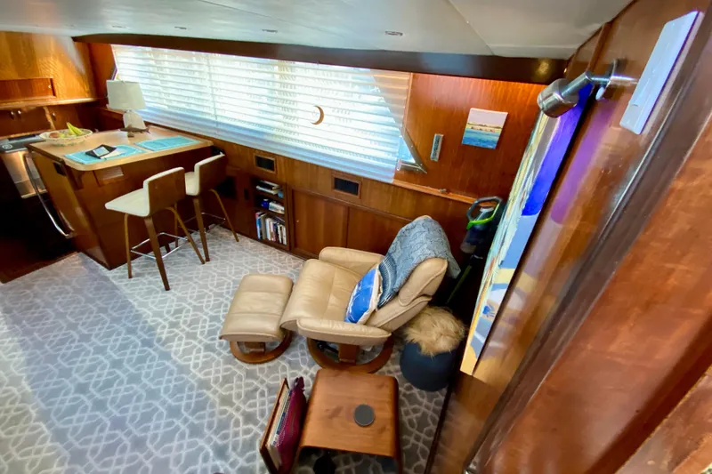 Slide: The Image of Luxurious interior of a 1971 Hatteras 43 Double Cabin yacht with elegant seating and decor. - 45