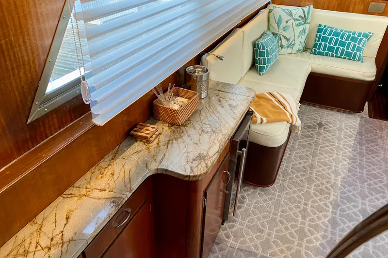 Slide: The Image of Luxurious interior of 1971 Hatteras 43 Double Cabin yacht with elegant wood finishes. - 46